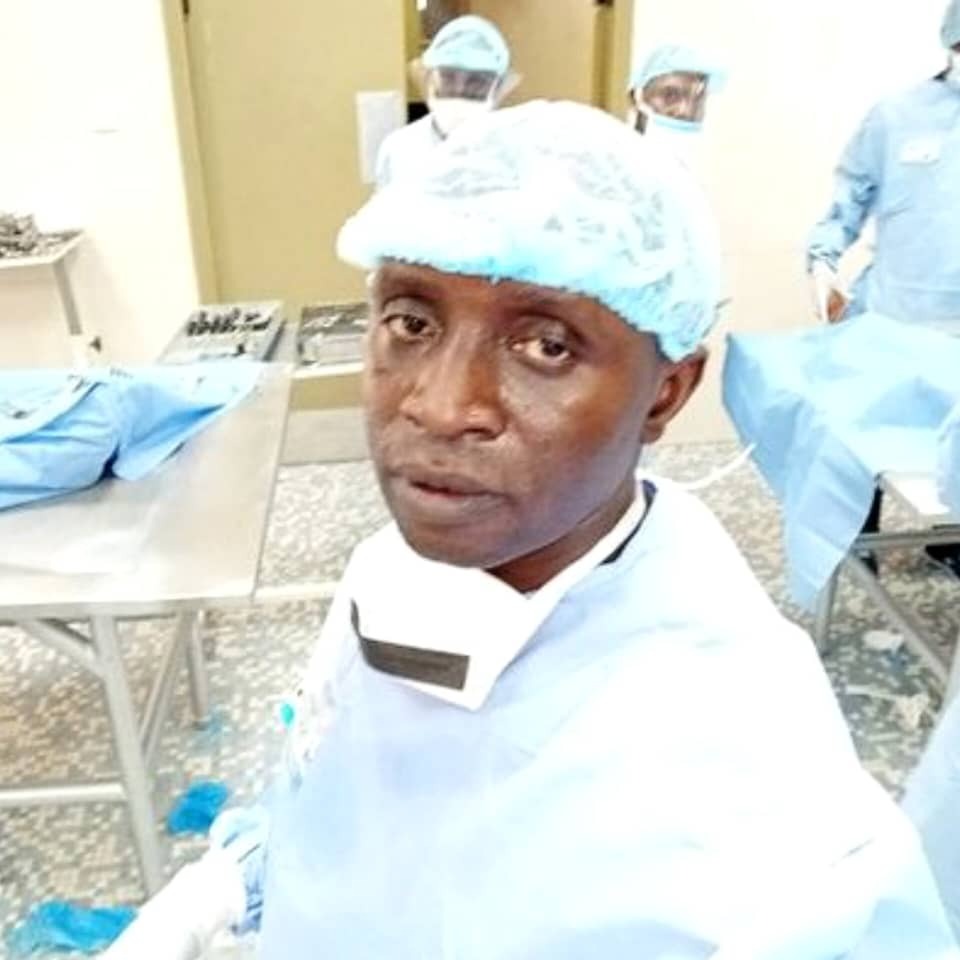 Professor Danjuma Sale in operating room